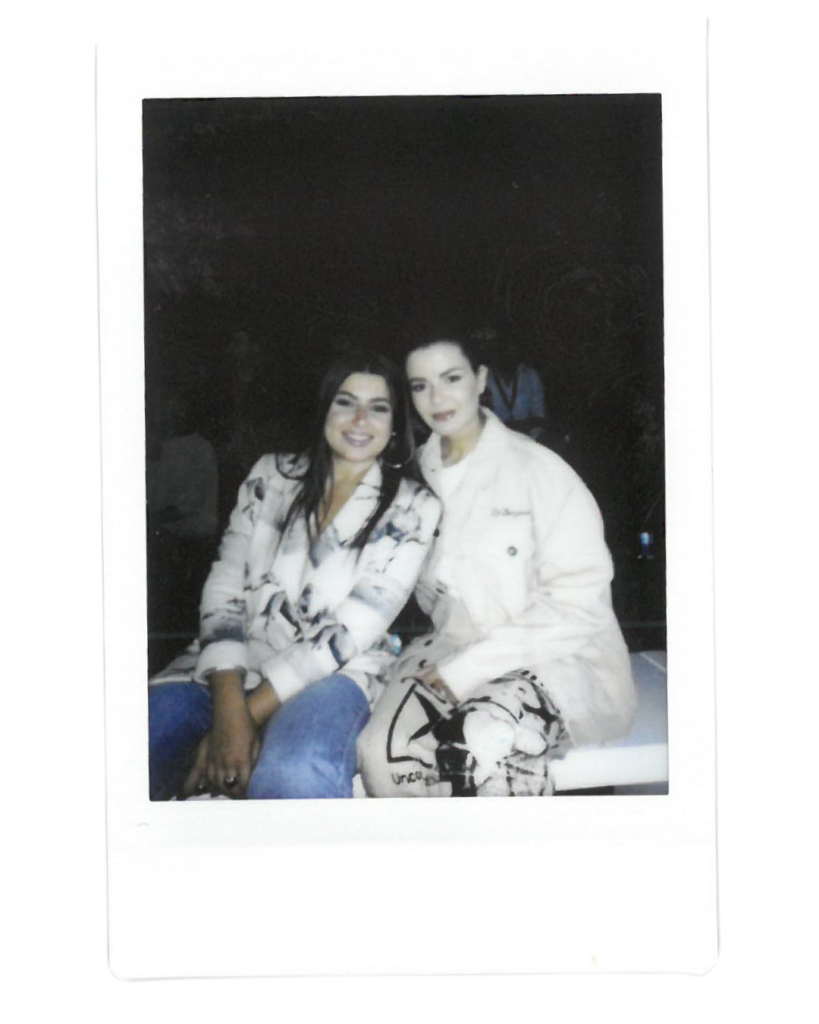 Mina Al Sheikly in a white and beige outfit poses at the les Benjamins show